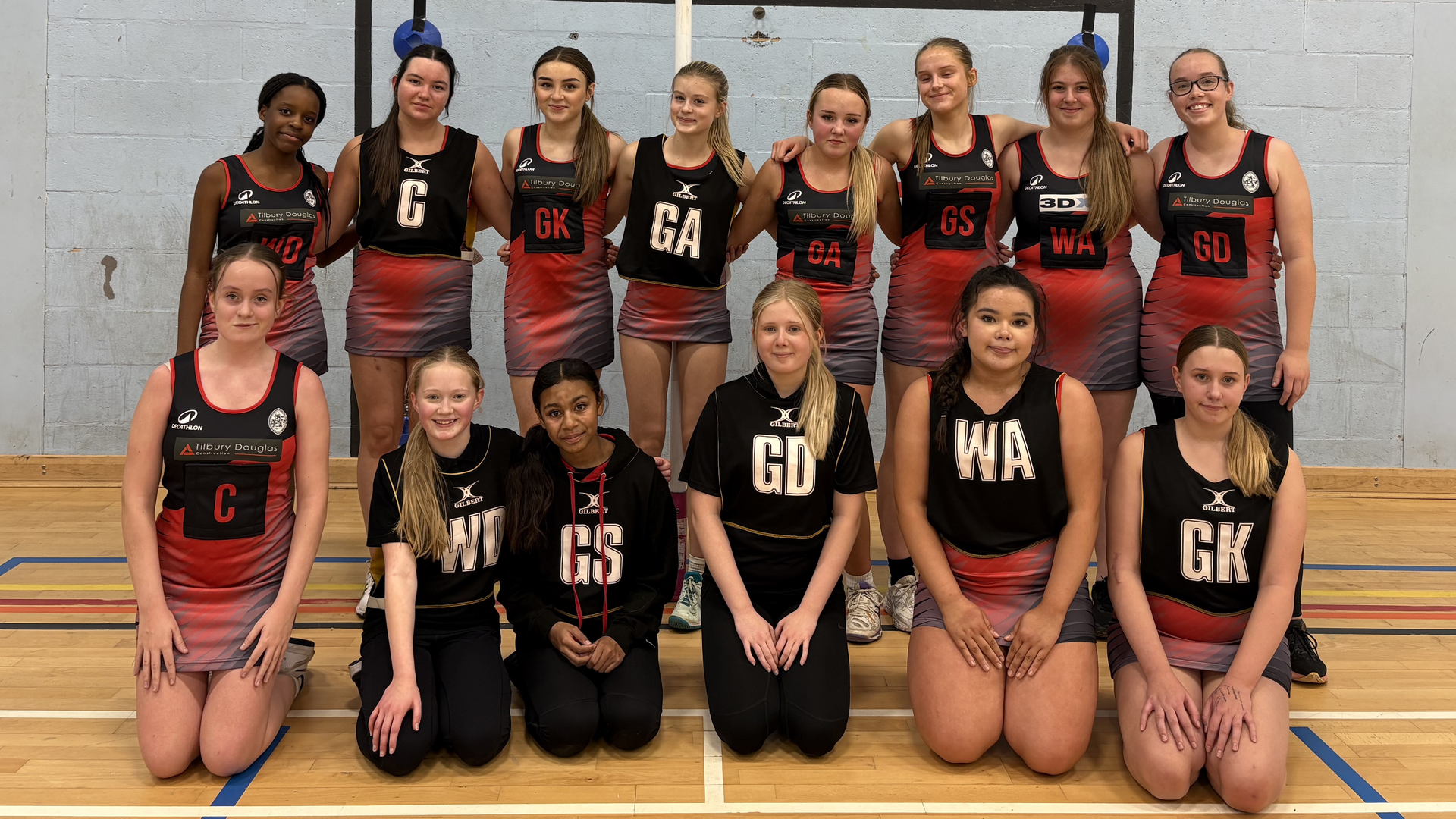 YEAR 9 AND 10 NETBALL TEAMS IN FRIENDLY ACTION AGAINST SFX. 