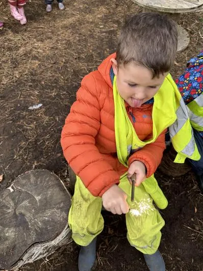 Autumn 2023 - 4th October - Acorns - Fire (solid to liquid - melting chocolate and using fire strikers), making mud play-dough and scavenger hunts! - image 1 Autumn 2023 - 4th October - Acorns - Fire (solid to liquid - melting chocolate and using fire strikers), making mud play-dough and scavenger hunts! - image 1