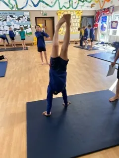 In gymnastics this week, the Year 6s created group sequences using unison and cannon - image 5 In gymnastics this week, the Year 6s created group sequences using unison and cannon - image 5