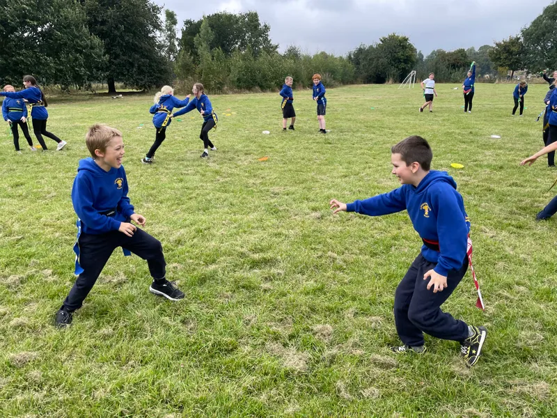 In rugby we introduced the process of removing tags to tackle. Children enjoyed playing games to practise this. - image 5 In rugby we introduced the process of removing tags to tackle. Children enjoyed playing games to practise this. - image 5