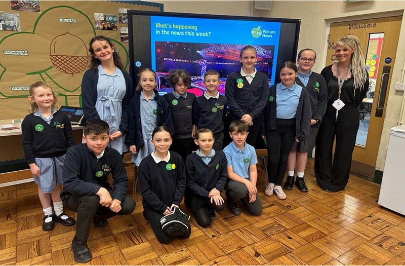                                The pioneers leading an assembly at Parkend School