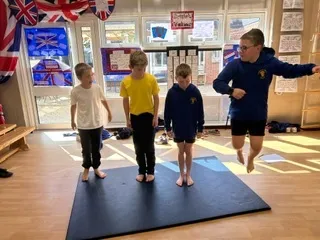 In gymnastics this week, the Year 6s created group sequences using unison and cannon - image 6 In gymnastics this week, the Year 6s created group sequences using unison and cannon - image 6