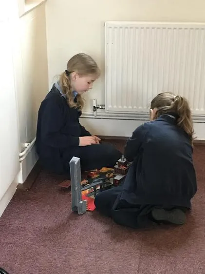 Enjoying some quiet games time after breakfast. - image 4