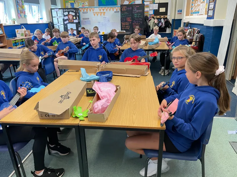 We began learning to play the ukulele in music. The children really enjoyed this - image 4 We began learning to play the ukulele in music. The children really enjoyed this - image 4