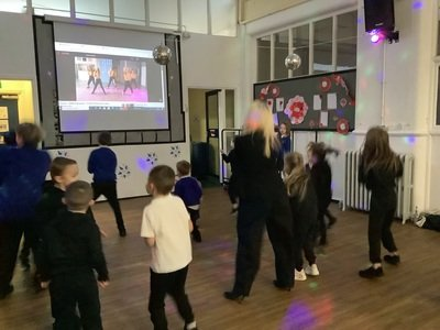 Mrs King joining in with the dancing fun