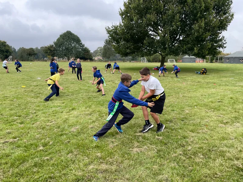In rugby we introduced the process of removing tags to tackle. Children enjoyed playing games to practise this. - image 6 In rugby we introduced the process of removing tags to tackle. Children enjoyed playing games to practise this. - image 6