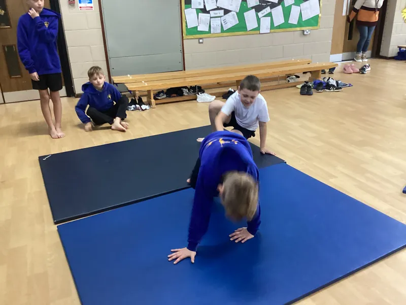 In PE we have been exploring twisted shapes. We linked balances together with different ways to travel - image 4 In PE we have been exploring twisted shapes. We linked balances together with different ways to travel - image 4