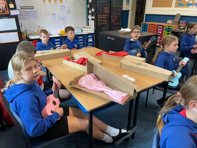 We began learning to play the ukulele in music. The children really enjoyed this - image 2 We began learning to play the ukulele in music. The children really enjoyed this - image 2