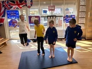 In gymnastics this week, the Year 6s created group sequences using unison and cannon - image 7 In gymnastics this week, the Year 6s created group sequences using unison and cannon - image 7