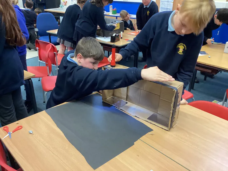 Ospreys were challenged to make a torch light shine into a box and come back out of the same side in a different place using mirrors - image 5 Ospreys were challenged to make a torch light shine into a box and come back out of the same side in a different place using mirrors - image 5