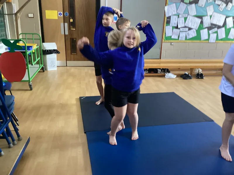 In PE we have been exploring twisted shapes. We linked balances together with different ways to travel - image 8 In PE we have been exploring twisted shapes. We linked balances together with different ways to travel - image 8