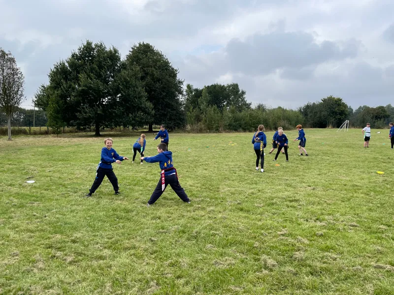 In rugby we introduced the process of removing tags to tackle. Children enjoyed playing games to practise this. - image 7 In rugby we introduced the process of removing tags to tackle. Children enjoyed playing games to practise this. - image 7