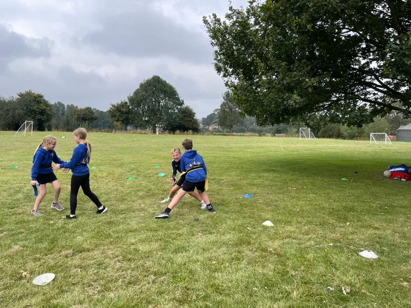 In rugby we introduced the process of removing tags to tackle. Children enjoyed playing games to practise this. - image 3 In rugby we introduced the process of removing tags to tackle. Children enjoyed playing games to practise this. - image 3