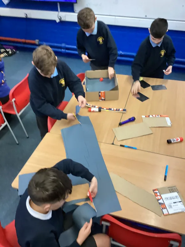 Ospreys were challenged to make a torch light shine into a box and come back out of the same side in a different place using mirrors - image 9 Ospreys were challenged to make a torch light shine into a box and come back out of the same side in a different place using mirrors - image 9