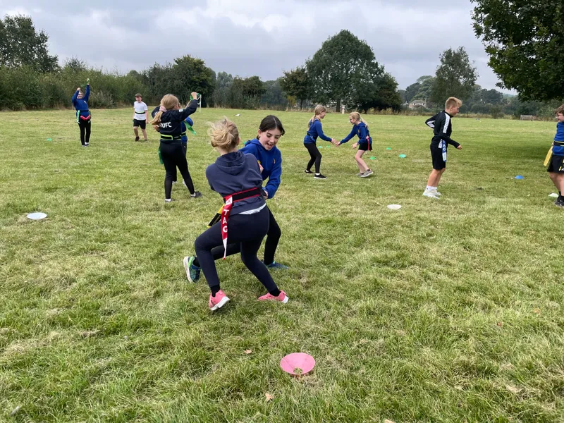 In rugby we introduced the process of removing tags to tackle. Children enjoyed playing games to practise this. - image 4 In rugby we introduced the process of removing tags to tackle. Children enjoyed playing games to practise this. - image 4