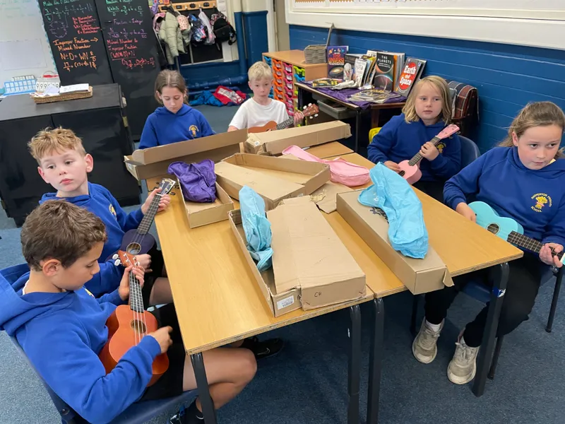 We began learning to play the ukulele in music. The children really enjoyed this - image 1 We began learning to play the ukulele in music. The children really enjoyed this - image 1